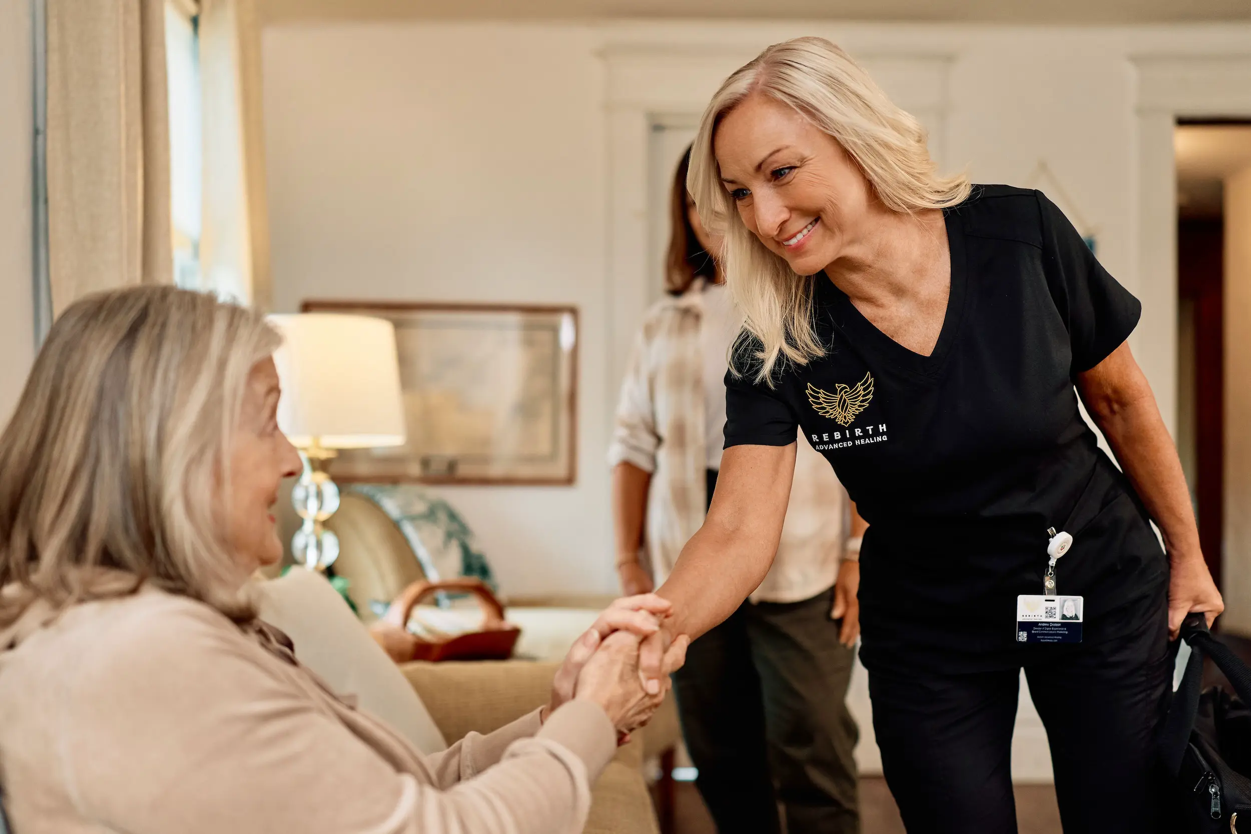 A Rebirth Advanced Healing provider meets with a chronic wound patient in their home.