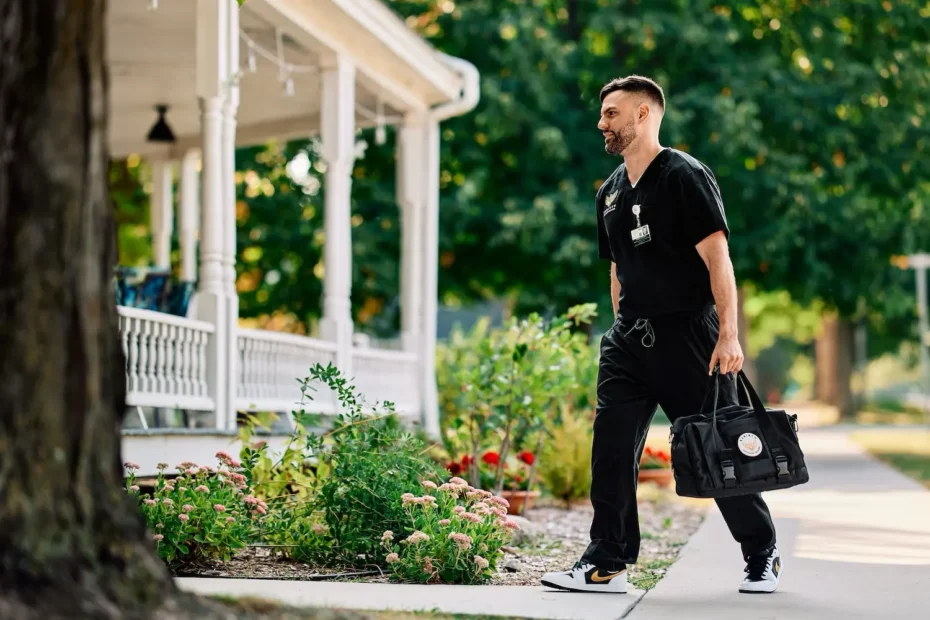 A Rebirth Advanced Healing clinician walks into a patient's home with his medical bag.